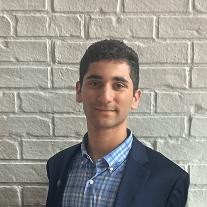 A headshot of Joseph